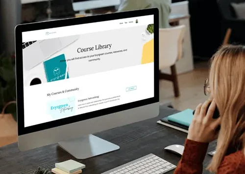Woman browsing Evyrgreen Networking Course Library